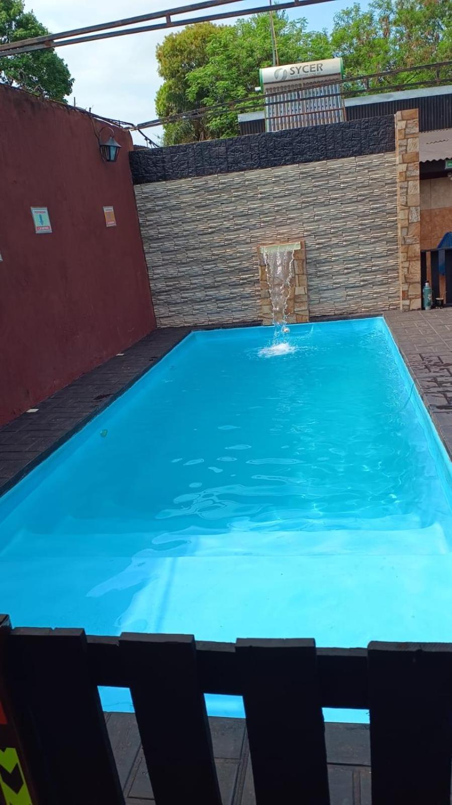 Residencial Arcoiris Hotel Puerto Iguazu Bagian luar foto